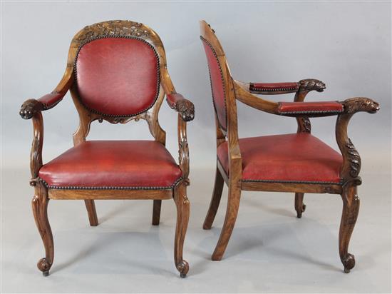 A set of six mid 19th century Anglo Indian carved padouk elbow chairs, W.2ft H.3ft 1in.